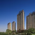 Modern High Rise Residential Buildings With Glass Facades And Surrounding Trees