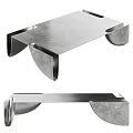 Modern Metallic Coffee Table With Sleek Stainless Steel Surface And Geometric Legs