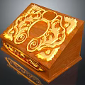Wooden Decorative Box With Golden Intricate Carvings And Ornate Surface Design