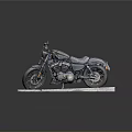 Stylish Black Cruiser Motorcycle Displayed On Gray Stone Slab Against Dark Backdrop