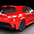 Red Toyota Sporty Hatchback With Black Wheels Aggressive Grille And Aerodynamic Body Design