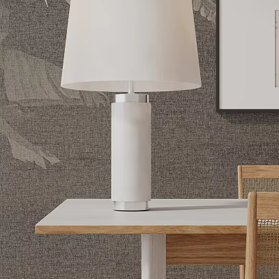 White Cylinder Table Lamp With White Shade On Light Wood Table And Gray Wall 3d model