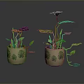 Green Leafy Plants in Decorative Pots with Leaf Patterns for Interior Decor