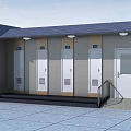 Outdoor Public Toilet Facility With Gray Roof Multiple Doors Steps And Handrails