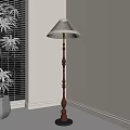 Stylish Floor Lamp With Wooden Stand And Beige Lampshade Near Potted Plant And Window Blinds