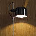 Modern Black Floor Lamp With Cylindrical Shade And Warm Light For Living Room Interior