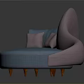 Curved Multi Person Sofa With Pink And Blue Upholstery And Cushions