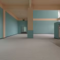 Spacious Fitness Studio With Blue Walls Carpeted Floor And Columns
