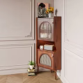 Decorative Walnut Cabinet Featuring Arched Glass Lattice Doors With Candles Radio Clock And Green Plant