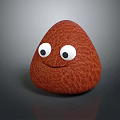 Brown Pebble Shaped Decorative Ornament Set With Textured Surface Big Eyes And Smiling Face