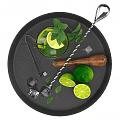 Fresh Lime Mint Drink With Ice Cubes And Bar Tools On Black Tray