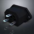 Black Computer Power Socket Accessory With Metal Prongs And Stable Base Design 3d model
