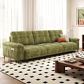 Green Sofa With Pillows And Wooden Coffee Table On Black White Geometric Rug