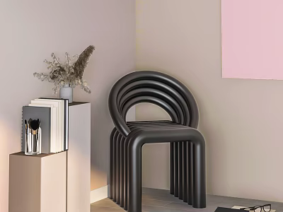 Modern Curved Black Lounge Chair with Books Vase and Pink Wall Art Decor 3d model