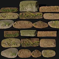 Collection Of Ground Stones In Various Shapes With Moss Textures