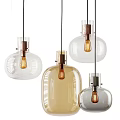 Modern Glass Pendant Lights With Transparent Amber Shades And Copper Silver Bases