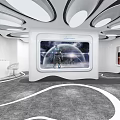 Modern Exhibition Hall With Curved White Black Structures And Display Screens