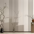 Modern Interior With Striped Wall Black And Transparent Vases Holding Bare Branches On Wooden Stand