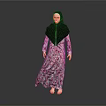 Woman in Floral Dress and Black Hijab Standing Against Gray Background