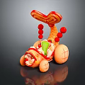 Creative Fish Shaped Food Sculpture With Red Tail Beads Orange Body And Green Decorations