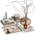 Modern Decorative Ornament Set Including Amber Vase Twigs Stacked Books Candles Tray and Glass Beads