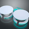 White Circular Devices With Blue Glowing Edges And Ring Shaped Bases On Dark Background