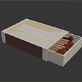 Open Matchbox With Red Wooden Matches And White Brown Labeled Exterior