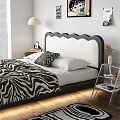 Double Bed With Zebra Print Quilt Black And White Headboard Nightstand And Table Lamp