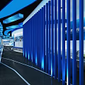 Modern Tech Exhibition Hall Interior With Blue Lighting And Digital Displays