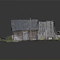 Old Wooden House With Gray Tiled Roof And Wooden Structure Near Small Shed On Grass