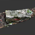Natural Wood and Stone Decorative Piece With Mossy Surface and Earthy Textures