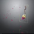 Hanging Pink Flower In Transparent Frame With Scattered Petal Fragments Dark Background And Reflection