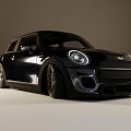 Shiny Black Sporty Compact Car With Alloy Wheels And Front Grille Design