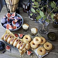 Tasty Brunch Spread With Fresh Figs Donuts Cappuccino Pastries Blackberries And Olive Spread