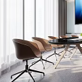 Modern Conference Room With Natural Light Round Meeting Table Brown Chairs And Large Screen
