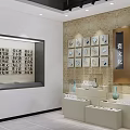 White Layered Display Shelves With Vases And Small Ornaments On Textured Wall