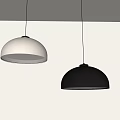Modern White and Black Dome Shaped Pendant Lights with Warm Illumination on Neutral Wall
