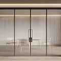 Modern Glass Sliding Doors With Black Frame And Vertical Stripes In Dining Interior