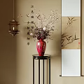 Red Vase With Blooming Flowers On Black Stand Near Chinese Calligraphy And Bamboo Painting