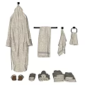 Soft Beige Bath Towels With Hanging Robe Folded Towels And Slippers