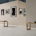 Minimalist Gallery Space With Framed Black White Photos And Wooden Bench
