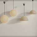 Beige Woven Pendant Lights with Spherical and Dome Shaped Design on White Wall