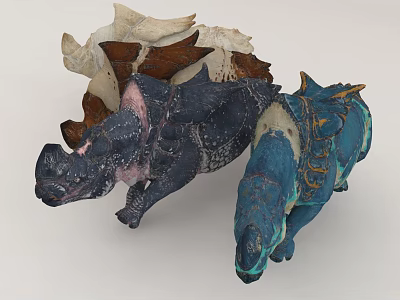 Display Of Three Dinosaur Models With Varied Colors And Shapes 3d model