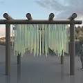 Art Installation With Wooden Frame Hanging Transparent Strips Curtain Effect Sunset Water Reflection