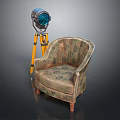 Classic Patterned Fabric Armchair With Wooden Legs Beside Yellow Tripod Floor Lamp