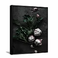 Organic Garlic Bulbs With Fresh Green Leaves On Dark Surface