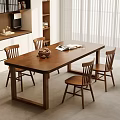 Wooden Dining Table Set With Four Matching Chairs And Open Book On Top