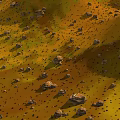 Yellow Green Terrain Model With Rolling Hills And Scattered Stones