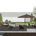 Stylish Courtyard Garden With Wooden Deck Outdoor Seating Sunshade Umbrella And Green Plants