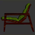 Comfortable Green Padded Chair With Red Wooden Armrests And Legs